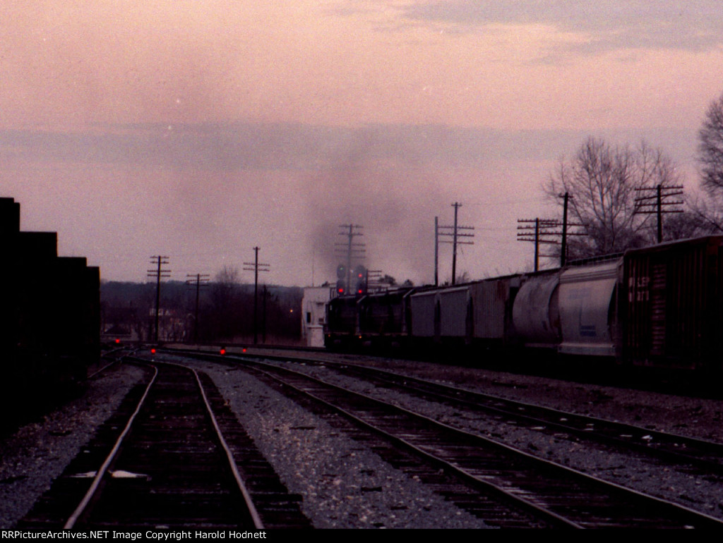 A trio of SD45's leave the north end of Raleigh yard on a clear signal